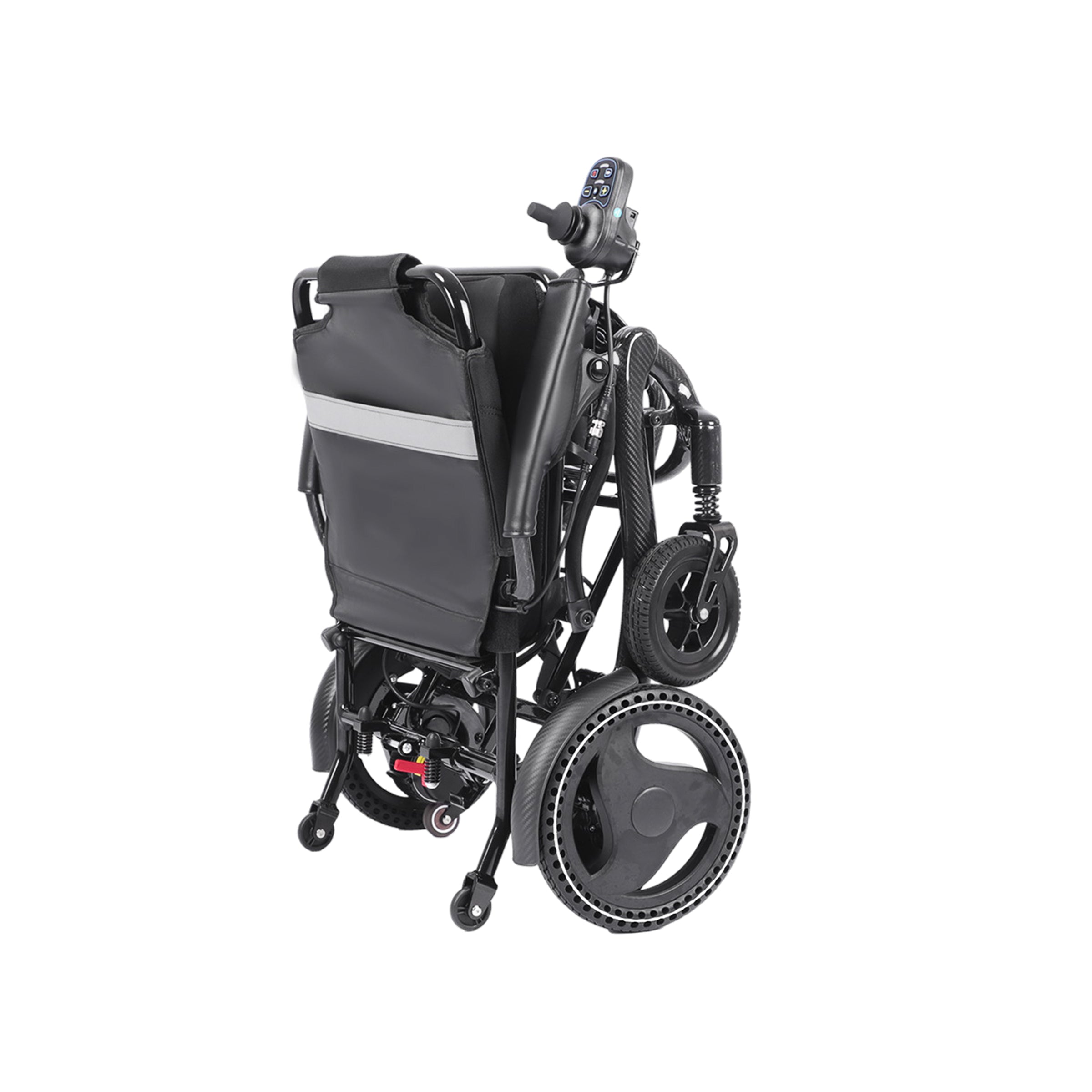 A three-quarter rear view of the Harvey Carbon Power Wheelchair in its folded state. The matte black chair is shown compressed, with the padded black backrest facing forward and featuring a prominent reflective silver strip across its width. All four wheels are compressed and visible, including the textured drive wheels and smaller front casters. The joystick controller on its armrest is visible at the top, and a footplate assembly is folded below.