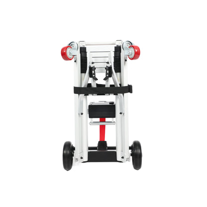 A front-facing view of the Muvon Mobility portable lift in its folded, storage-friendly configuration. The image showcases the symmetrical design of the silver aluminum frame, featuring two prominent red caster wheels at the top and two larger black rubber wheels at the base. A black security strap with a buckle is centered around the telescopic legs, while the internal motor housing and red lifting strap are visible in the middle of the frame.