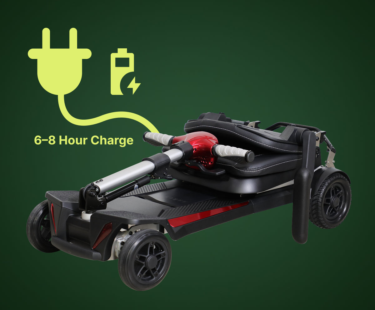 The Muvon One mobility scooter shown in a partially folded state with the seat and tiller collapsed down toward the base. A large yellow graphic of a power plug and battery icon is accompanied by the text "6–8 Hour Charge," indicating the standard charging time for the device.
