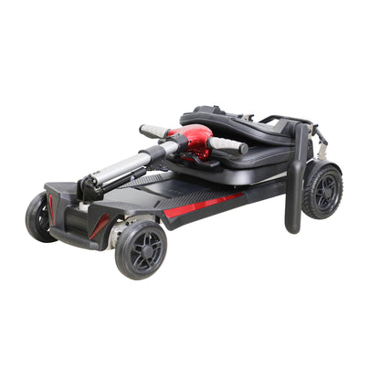 The shot emphasizes the carbon fiber rear fenders, the dual-motor drive system, and the safety reflectors on the back of the seat of Muvon One Mobility Scooter. The compact and portable design of the frame is clearly visible.